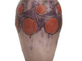 a vase that is sitting on a white surface