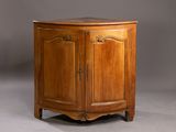 a wooden cabinet with a door and a drawer