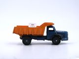 a toy truck with a sign on the back of it