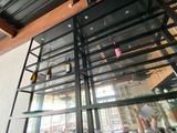 a glass display case in the middle of a room
