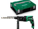 a close up of a drill and a tool on a white background