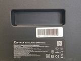 a close up of the back of a laptop with a barcode on it