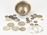 a lot of coins that are sitting on a table