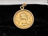an image of a gold coin with an angel on it