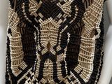 a black and gold beaded dress on a mannequin mannequin mannequin mannequin mannequin mannequin mannequin manne
