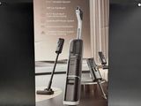 a box of a vacuum that is sitting on the floor