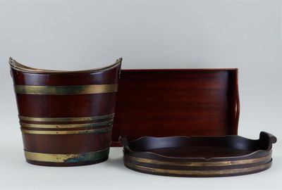 two pieces of wood and metal are sitting next to each other