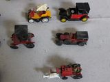 a lot of toy cars and trucks on the table