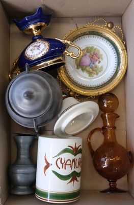 a box filled with different types of vases and plates