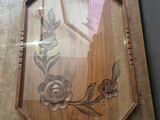 a picture of a picture of a wooden frame with flowers on it
