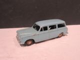 a blue toy car that is sitting on a table