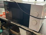 a microwave that is sitting on top of a table