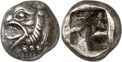 a silver coin with an image of a bird on it