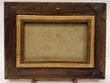 an old picture frame with a picture in it on a wooden stand