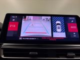 the dashboard of a car with a digital display on it