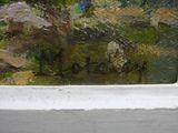 une image d'un tableau sur le mur d'un bâtiment