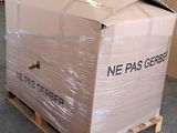a large box sitting on a pallet in a warehouse