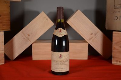 a bottle of wine that is sitting on a table