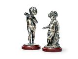 paire de figurines anciennes en argent représentant un garçon et une fille