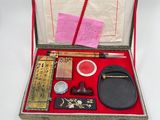 a box with various items in it on a table