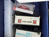 three train cars that are sitting in a box
