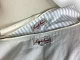 the back of a white shirt with a blue and white stripe on it