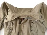 an image of a close up of a jacket on a white surface