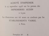 an open book with a black and white image of a clock on it