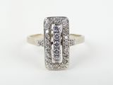a close up of a diamond ring on a white background