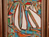 an oil painting of a sailboat in a wooden frame on a wall