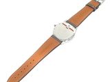 wrist watch with brown leather strap on white background