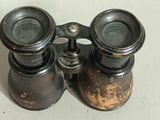 a pair of binoculars that are sitting on a table