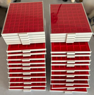 a couple of red and white boxes sitting on top of a table