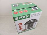 packaging of a box for a digital pressure cooker on a table
