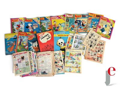 a lot of comics on display on the table