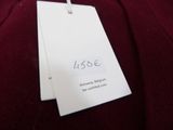 a tag on a red shirt that says l ' s side