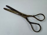 a pair of scissors that are sitting on a table