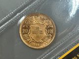 a gold coin in a clear plastic case
