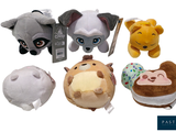 six stuffed animals that are sitting next to each other