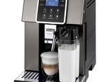 a coffee machine with a cup of milk on top of it
