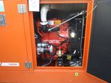 an orange machine that is sitting in a room