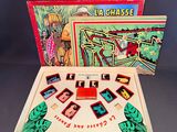 a box with a game set in it on a table
