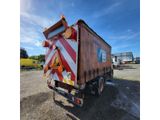 an image of a truck that is parked in a lot
