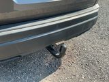 an image of a car that is parked on the side of the road