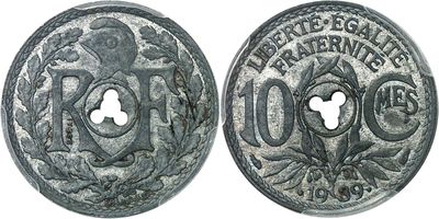a close up of a coin with a keyhole in the middle