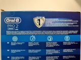 a box of toothpaste on a table with instructions