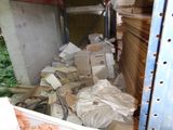 a large pile of boxes in the back of a truck