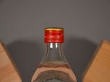 a bottle of water that is sitting on a table
