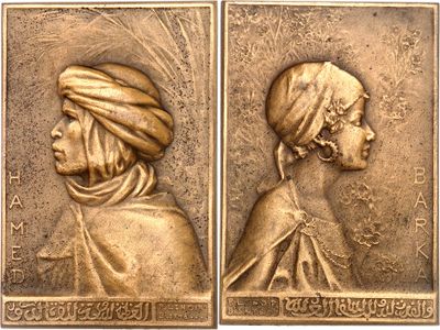 two bronze plaques depicting a woman and a man with turban
