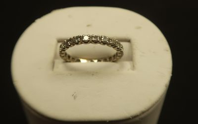 an image of a diamond ring in a white box